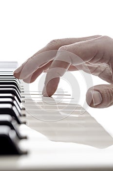 Isolated hand of pianist photo