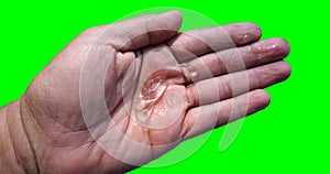 Isolated hand with sanitizing gel