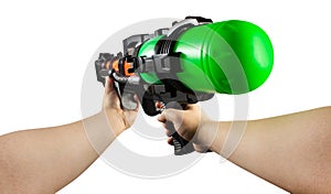 Isolated hands holding water gun