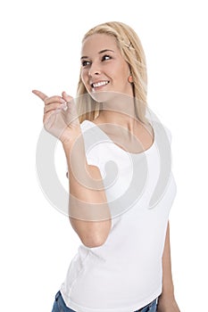 Isolated happy female teenager presenting with her finger over w