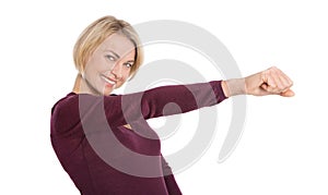 Isolated happy mature woman with outstretched arm and fist.