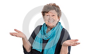 Isolated happy senior woman wearing blue scarf presenting with h