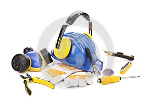 Isolated hard hat with tools and blueprint