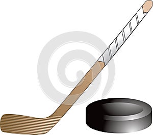 Isolated hockey puck and stick