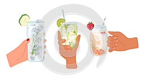 Isolated human hands holding cold iced drinks, fruits juicy lemonade or non-alcoholic beverage