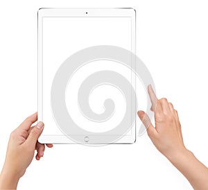 Isolated human left hand holding white tablet computer