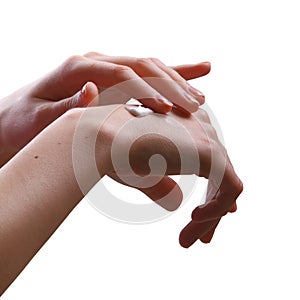 Isolated image girl applying white cream to hands