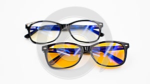 Isolated image of two blue light blocking glasses