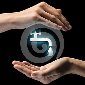Isolated image of two hands on black background. Water drop icon