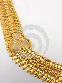 Isolated  Indian gold necklace closeup