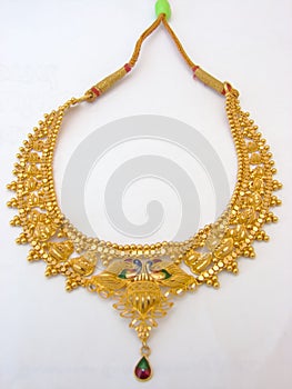 Isolated  Indian gold necklace closeup