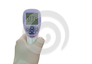 Isolated of an infrared thermometer on white background. The screen shown 37.7 degrees celsius that means a low fever