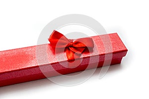 Isolated item red christmas box with red ribbon for gift on white background.