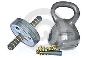 Isolated kettlebell, ab wheel and jumping rope on white background