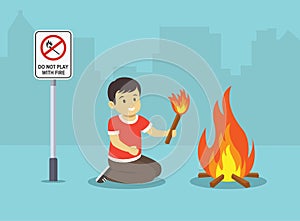 Isolated male kid playing with fire. Do not play with fire warning sign.