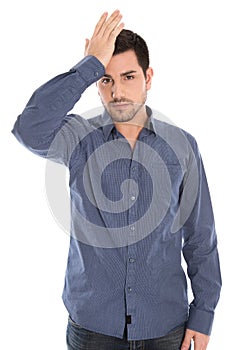 Isolated man with blue shirt shocked and depressed.