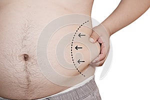 isolated man hand garbing his belly fat with a draw line