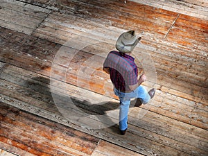 Isolated man of line dance traditional western folk music dancers