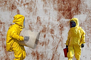 Isolated mans in protective hazmat suit