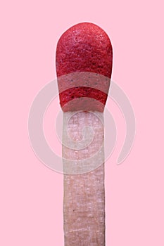 Isolated matchstick with pink background - Macro shoot