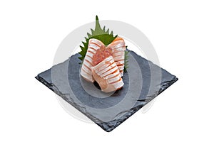 Isolated Medium Rare Salmon Sashimi Served with Ikura Salmon Roe and Sliced Radish in Stone Plate