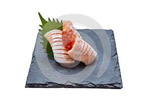 Isolated Medium Rare Salmon Sashimi Served with Ikura Salmon Roe and Sliced Radish in Stone Plate