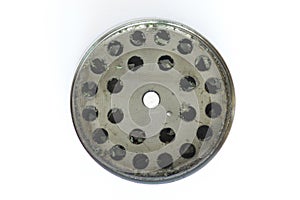 Isolated Metallic gray part of grinder for buds of marijuana isolated
