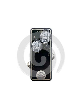 Isolated mini boutique black and clear knob vintage overdrive stomp box pedal electric guitar effect on white background.