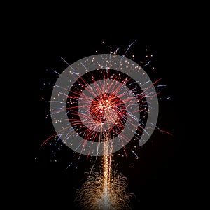 Isolated multi colored event firework at night