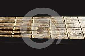 Isolated neck of a acoustic guitar photo