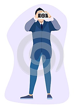 Isolated object. The man in the suit is a photographer. In minimalist style. Cartoon flat raster