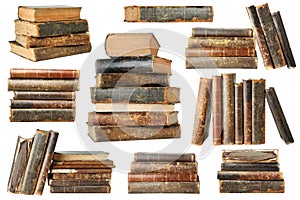 Isolated old books in piles and stacks