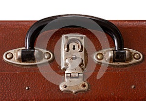 Isolated Old Vintage Dusty Brown SuitcaseIsolated Handle of an Old Vinatge Dusty Brown Suitcase