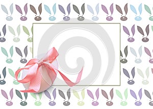 Isolated one easter white egg with pink ribbon on a white background with a pattern of Bunny rabbit muzzles with white copy space.