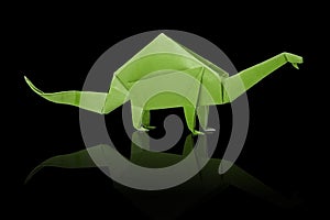 Isolated origami paper green dinosaur brontosaurus