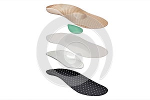 Isolated orthopedic insole on a white background. Treatment and prevention of flat feet and foot diseases. Foot care, comfort