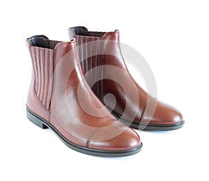 Isolated pair women`s leather boots