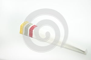 Isolated pH indicator paper on white background