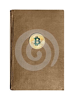 Isolated photo of brown leather book with bitcoin