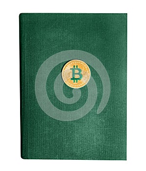 Isolated photo of green book with bitcoin