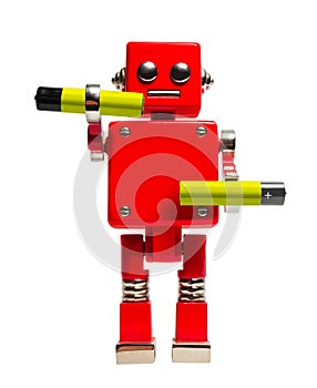 Isolated photo of red toy robot with alkaline batteries