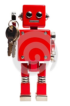 Isolated photo of red toy robot with keys