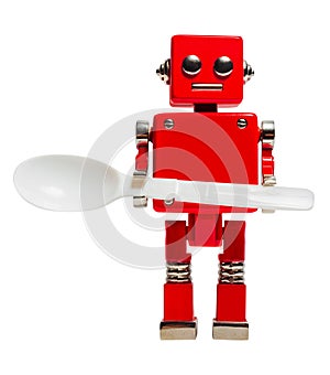 Isolated photo of red toy robot with plastic spoon