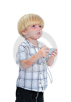 Isolated photo of young boy taking a photograph