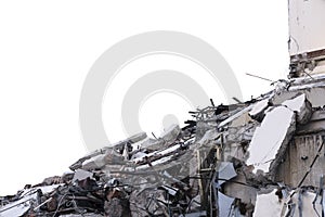 Isolated pile of rubble from a dismantled building at a demolition site.