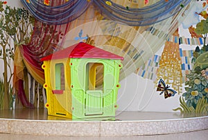 Isolated plastic children's playhouse on beautifully designed st