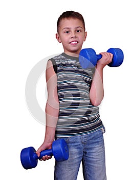 Isolated portrait of child exercising with dumbbells