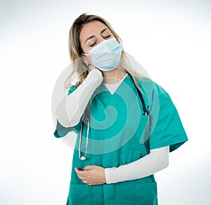 Isolated portrait of depressed and tired female Doctor Nurse Wearing Protective Medical Face Mask