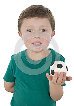 Isolated portrait of a fun little footballer.