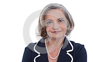 Isolated portrait of a satisfied senior female business woman.